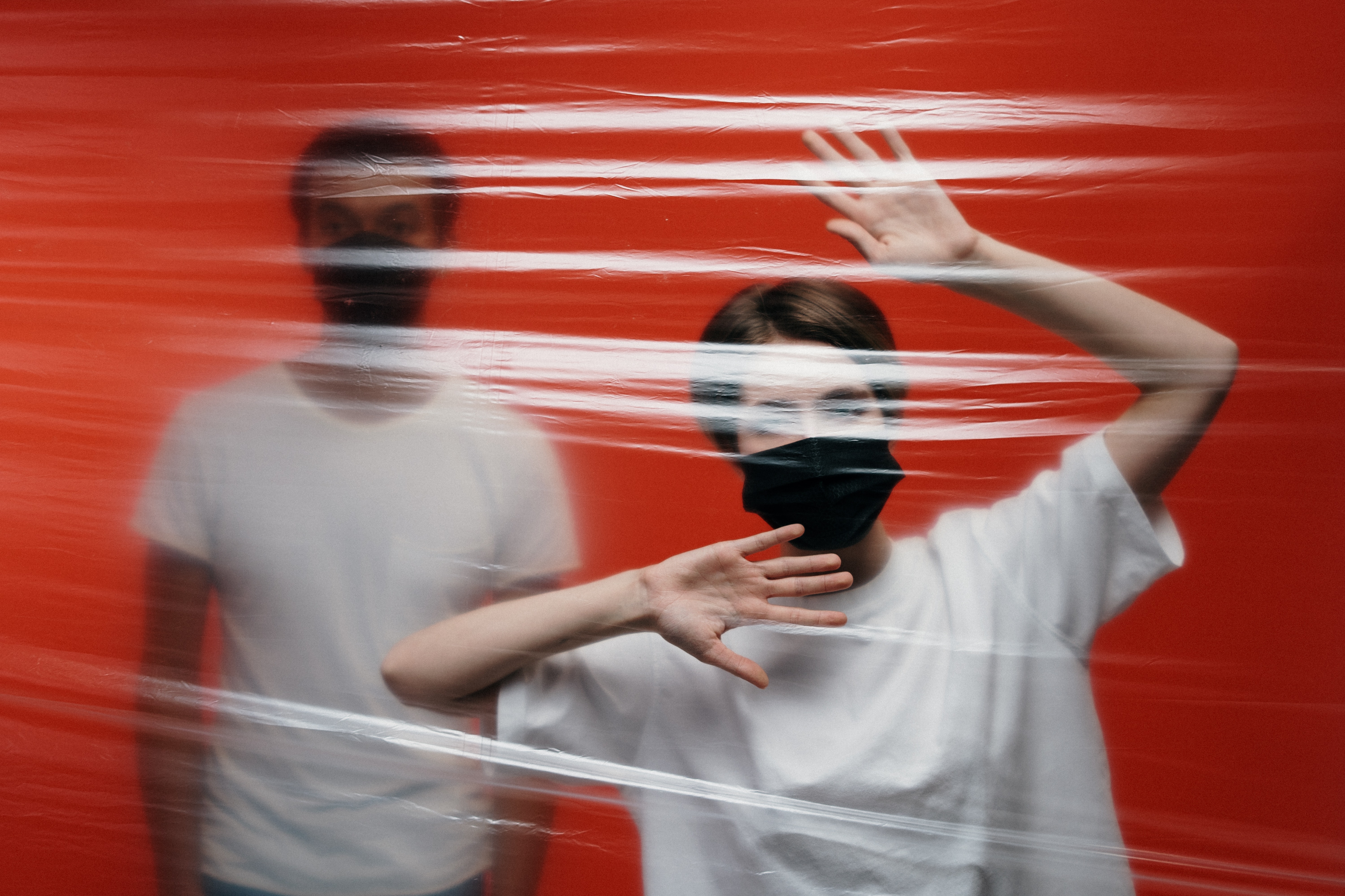 Two People Isolated wearing masks